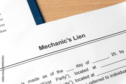 Legal document Mechanic Lien on paper close up with pen