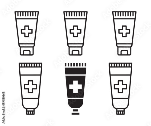 Collection of various illustrations of first aid cream tubes with a cross symbol, representing healthcare and topical medication.