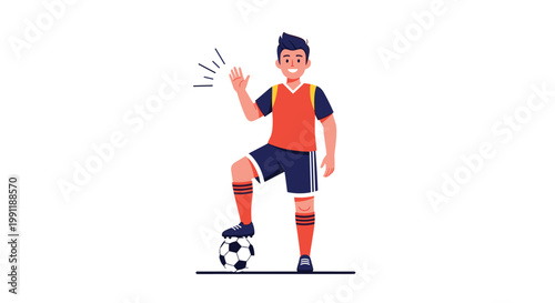 Cheerful male soccer player in a red and blue uniform stands with one foot on a ball and waves with a friendly smile.