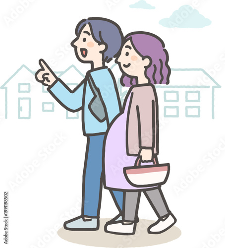 町中をお出かけする妊娠中の女性とパートナーの若い夫婦