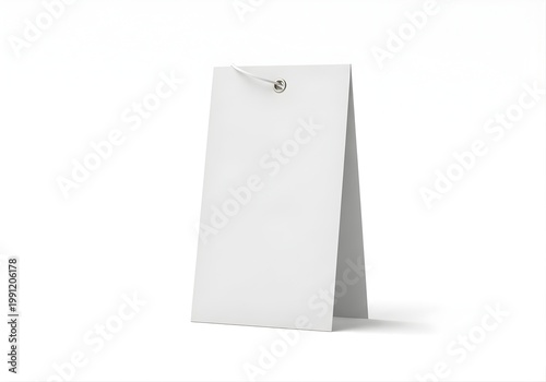 Isolated blank paper tag with metal grommet for retail branding, product label mockup, price display, clothing attachment