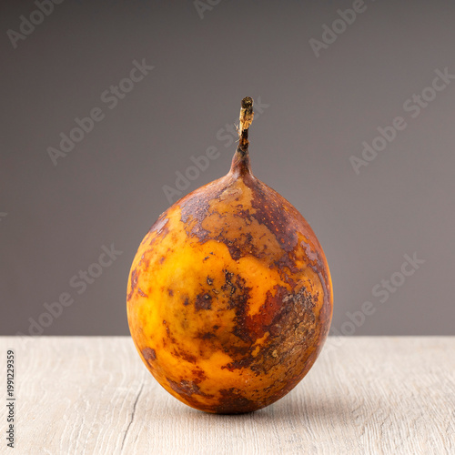 Decomposing Passiflora ligularis fruit - Granadilla