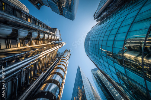 Low angle view of modern skyscrapers and high tech office buildings in London financial district, architecture and business concept