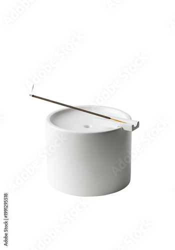 Elegant White Ceramic Pot with Metal Spoon for Cooking or Serving