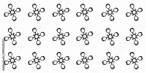Repeating pattern of ornate symmetrical black floral or cross shaped designs