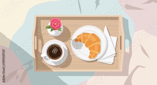 Breakfast serving tray with hot coffee and fresh croissant.