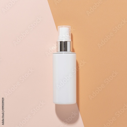 White cosmetic spray bottle with a silver cap