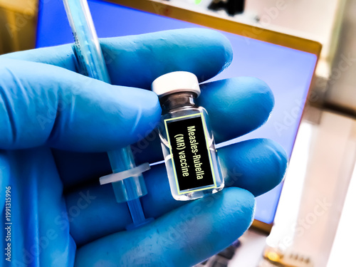 Tableau sur toile Medical syringe needle with measles, mumps, rubella label MR Or MMR vial of vaccine