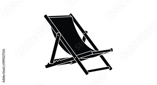 A black beach chair with a footrest