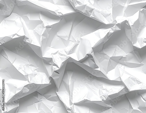 A close-up of crumpled white paper with varied creases