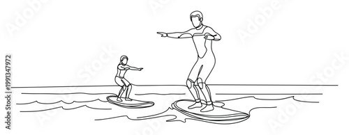 Adult and child surfing together on ocean waves wearing wetsuits for active summer water sports and recreation