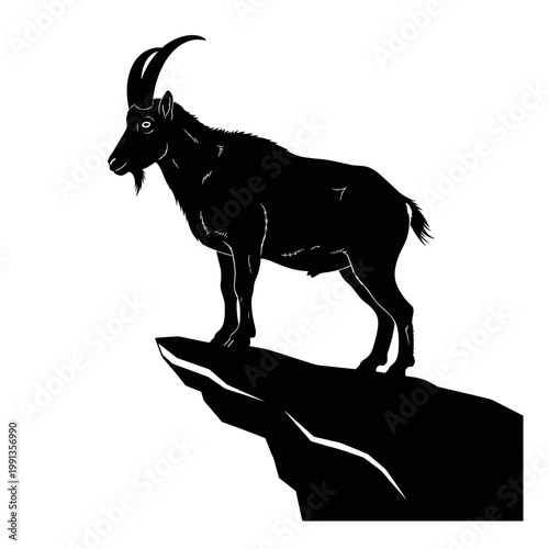 Black silhouette of a goat standing on a rock