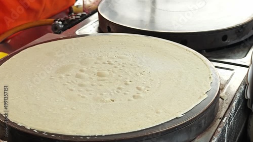 Thai style crepe on hot pan.