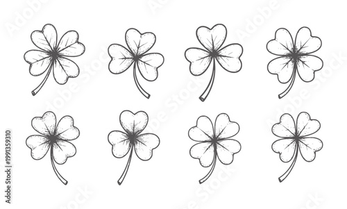 Hand drawn four leaf and three leaf clovers white shamrock
