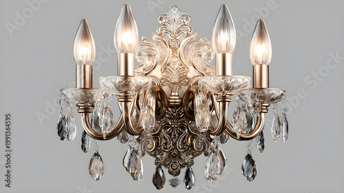 An antique silver candlestick with glowing candles serves as a shiny holiday decoration alongside crystal glass and gold jewelry for a festive celebration