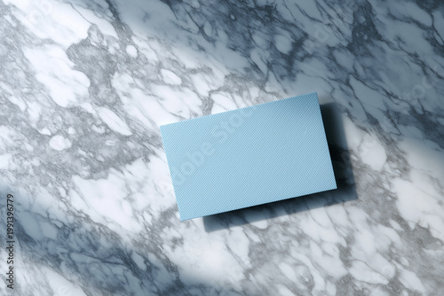 Blue business card mockup on marble background