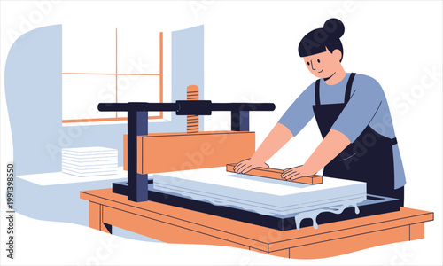 A woman using a manual press machine to flatten and shape paper sheets in a workshop
