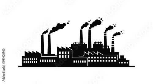 Silhouette of an industrial factory complex emitting smoke plumes