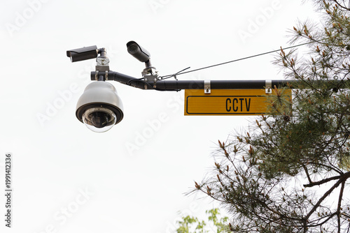 CCTV, security cameras in a public park to monitor and record things happen for safety