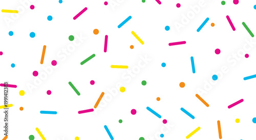 Colorful sprinkles on white background.