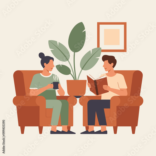 Couple in armchairs with coffee and book