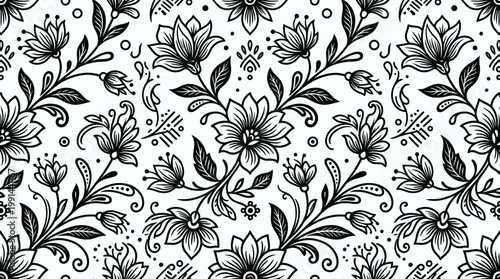 Intricate black and white floral pattern with blooming flowers and curling vines for textiles and design.