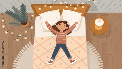 A young girl lies happily on her bed with her arms raised in a cozy bedroom with string lights and a plant
