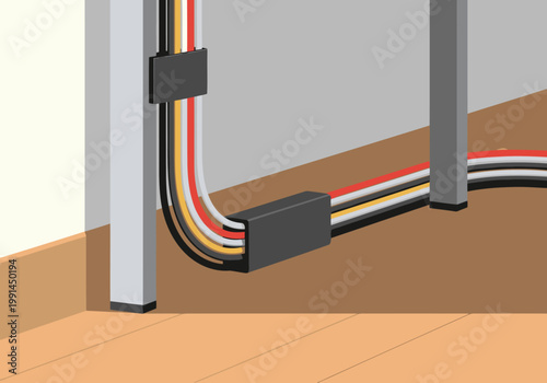 Clean cable management solution. Organized wires bundled neatly against a wall. Modern office setting. Professional and tidy workspace.
