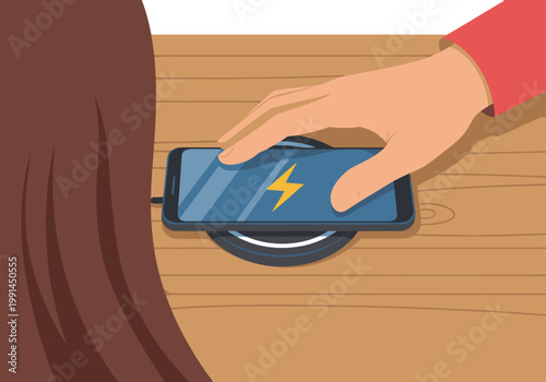 A hand places a smartphone on a wireless charging pad. Modern, clean design showcasing convenient charging. Suitable for tech and lifestyle visuals.