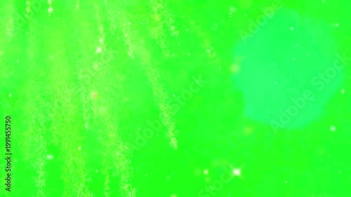 A vibrant green screen with a circular light reflection in the video