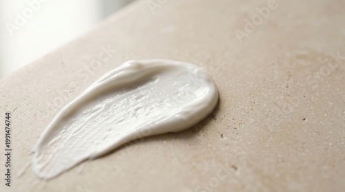 Applying creamy texture on smooth surface indoor setting high-quality photography