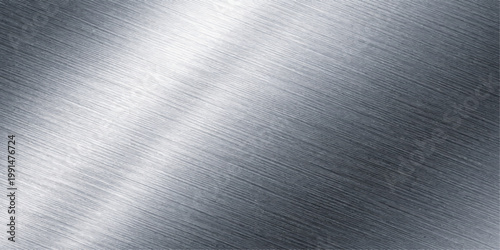 Polished silver brushed metal plate texture featuring a shiny stainless steel surface with a grey industrial aluminum pattern and metallic chrome light reflections