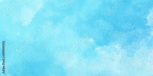 Soft watercolor background with light blue and white hues for design and artistic projects