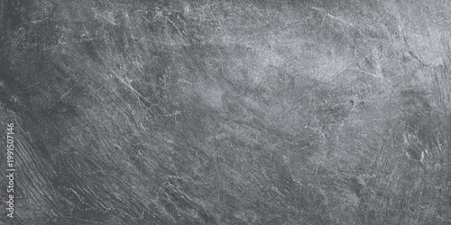 Gray wall  scratched stone texture background with rough surface and scratches