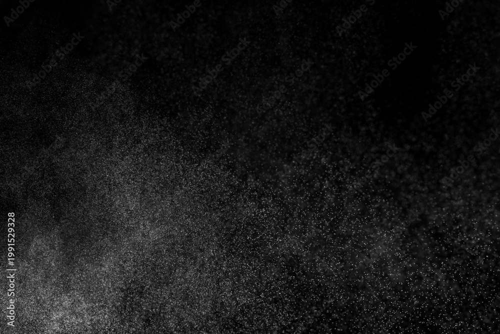 Fototapeta premium Water spray particle mist black background abstract texture