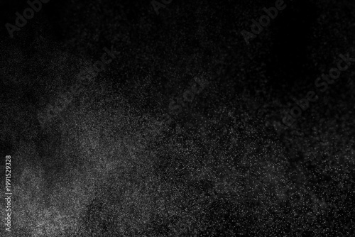 Water spray particle mist black background abstract texture