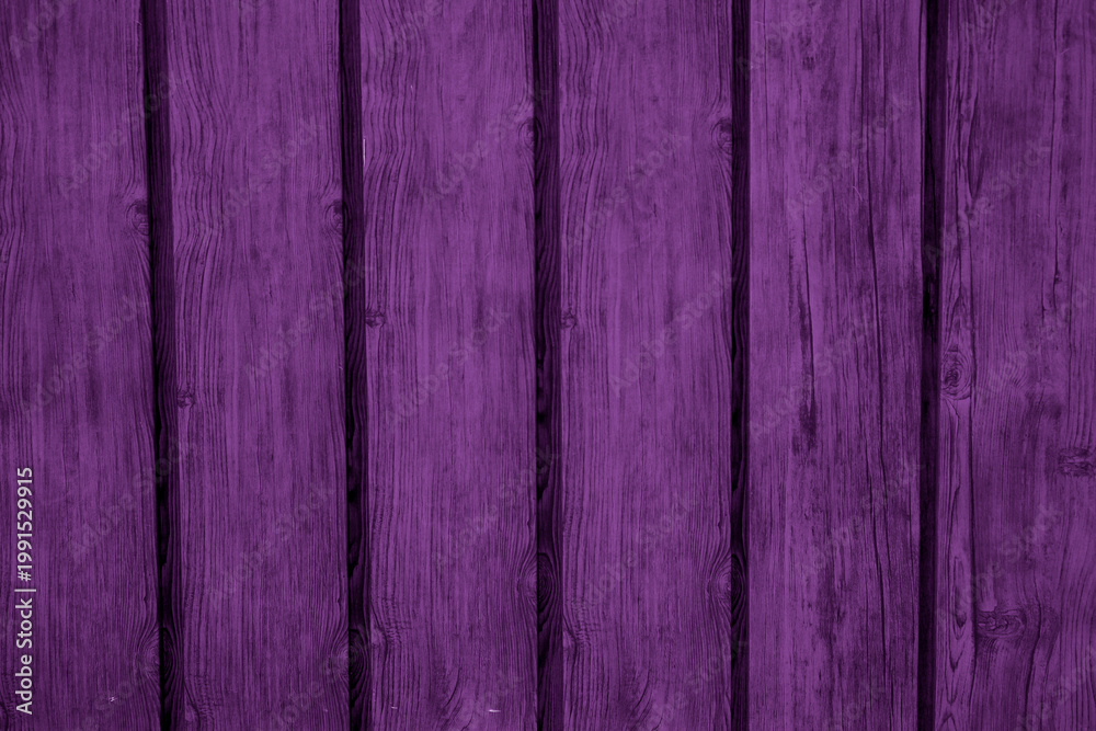 Fototapeta premium Vibrant purple wooden panels arranged in vertical lines for modern design projects