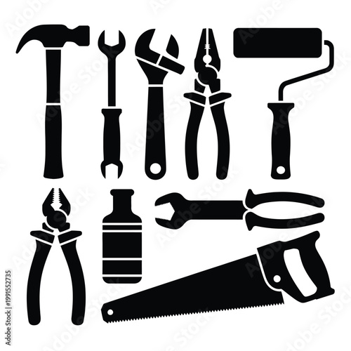A collection of various black tools on a white background