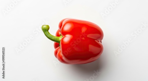 Vibrant red bell pepper isolated on white background for culinary use