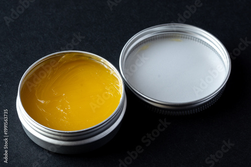 Obraz na plátně Beeswax in a jar for coating wooden surfaces