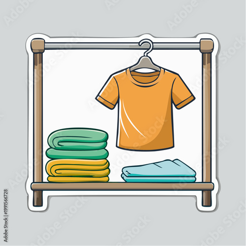 Clothing rack with t-shirt and folded towels