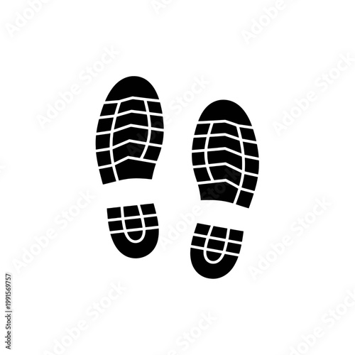 Two black shoe prints on a white background, showing the soles of the footwear clearly