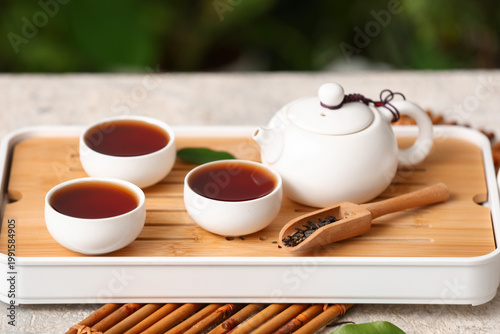 Tray with oriental teapot, ...