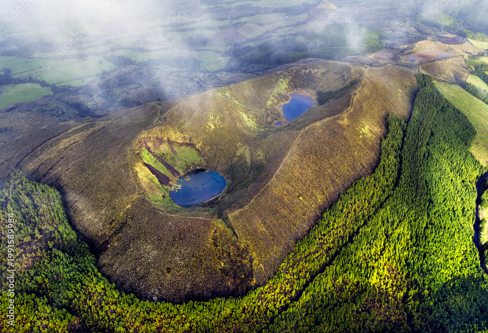 Fototapeta premium Landscape Panorama drone picture from Volcano to the rainforest with lake and wood, Azores, San Miguel, Portugal