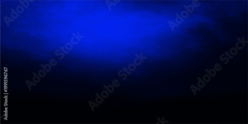 abstract deep blue light forming a vibrant glow against a rich dark backdrop, creating an immersive atmospheric effect. 