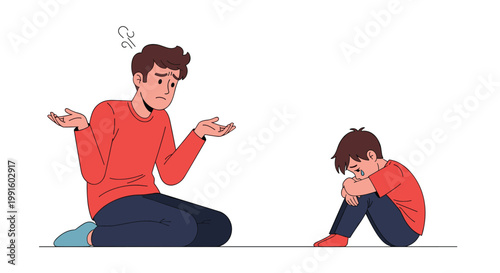 Worried father or teacher kneeling on the floor next to a sad young boy who is crying and hugging his knees in distress.
