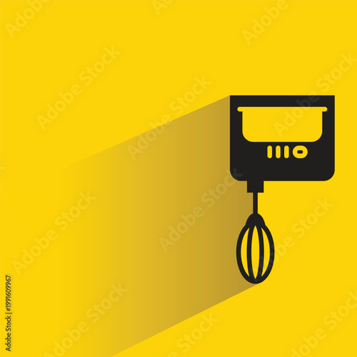 electric whisk icon with shadow on yellow background