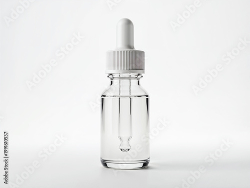 Bottle of medicine with dropper on a white background
