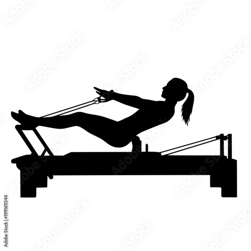 Person performing a rowing exercise on a reformer pilates machine