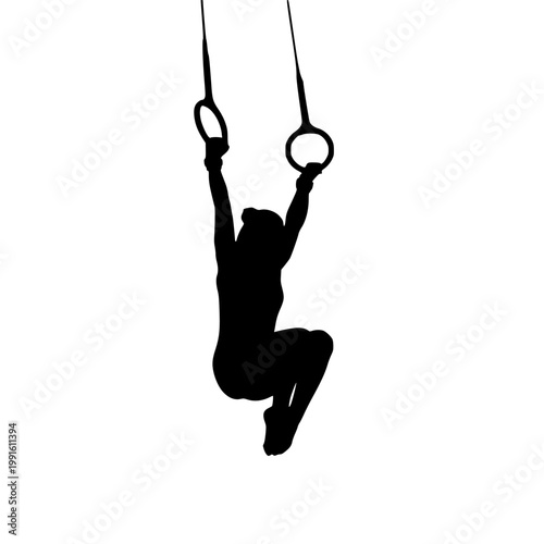 Athlete performing a dynamic ring exercise in mid-air silhouette